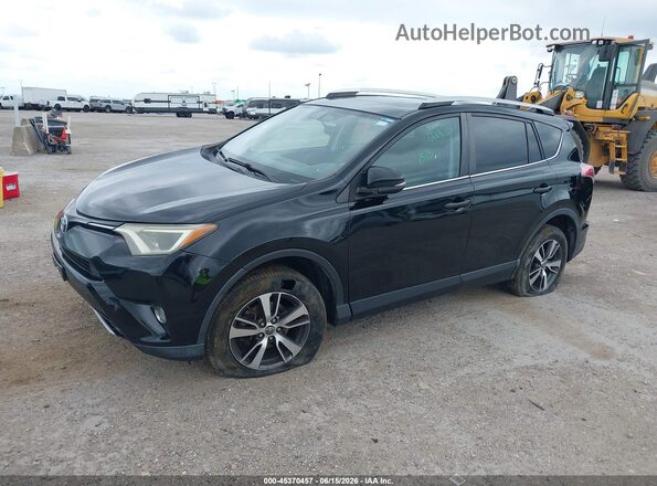2T3WFREV2GW235698 2016 TOYOTA RAV4 Черный Передняя левая четверть