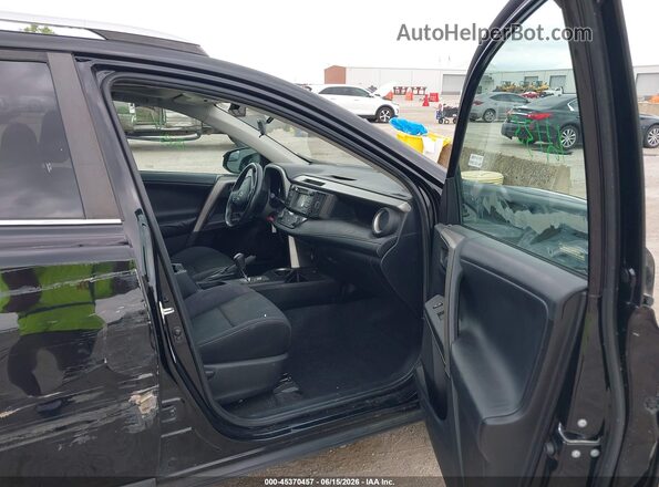 2T3WFREV2GW235698 2016 TOYOTA RAV4 Черный Вид салона спереди