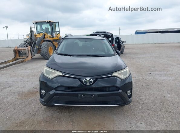 2T3WFREV2GW235698 2016 TOYOTA RAV4 Черный Вид щитка приборов