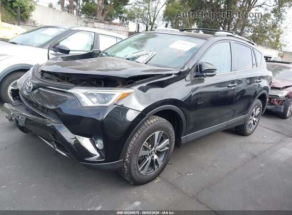 2T3WFREV2GW246104 2016 TOYOTA RAV4 Black 