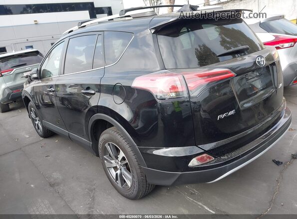 2T3WFREV2GW246104 2016 TOYOTA RAV4 Black 
