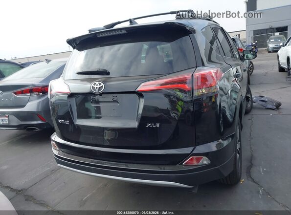 2T3WFREV2GW246104 2016 TOYOTA RAV4 Black 