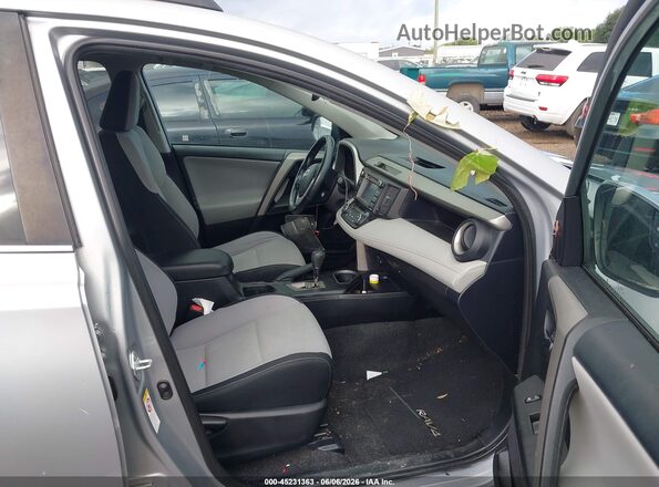 2T3WFREV2GW271813 2016 TOYOTA RAV4 Silver Вид салону спереду