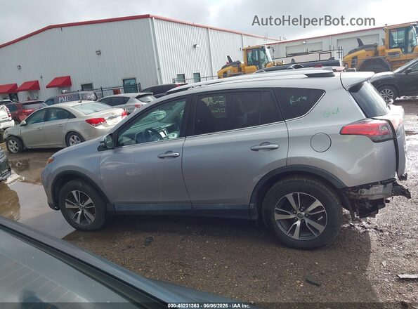 2T3WFREV2GW271813 2016 TOYOTA RAV4 Silver 