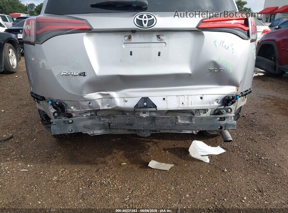 2T3WFREV2GW271813 2016 TOYOTA RAV4 Silver Вид спереду