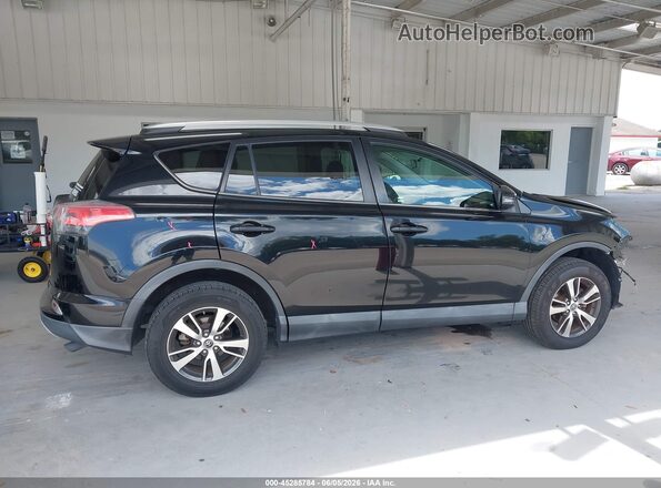 2T3WFREV2GW283511 2016 TOYOTA RAV4 Black 360 interior view
