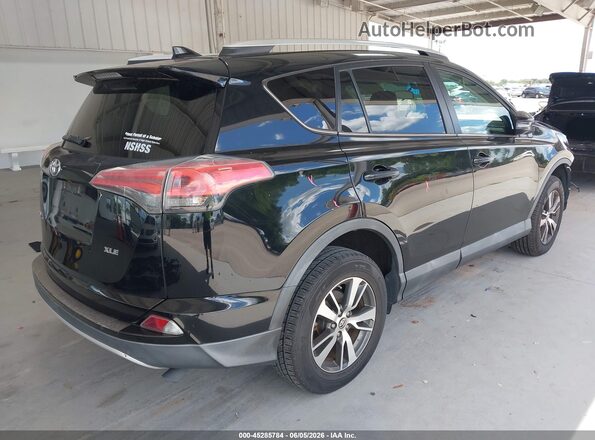 2T3WFREV2GW283511 2016 TOYOTA RAV4 Black Rear right