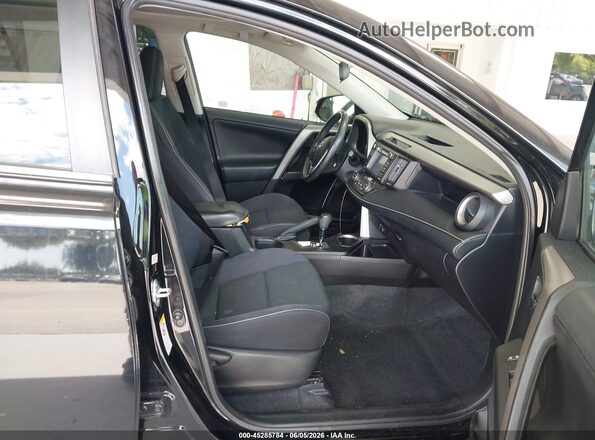 2T3WFREV2GW283511 2016 TOYOTA RAV4 Black Front interior view