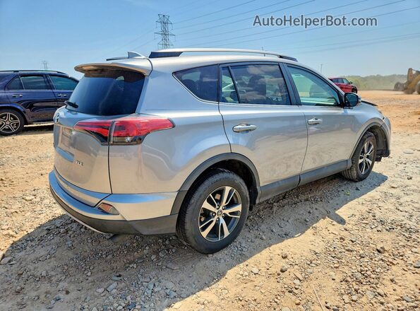 2T3WFREV2HW391791 2017 TOYOTA RAV4 Silver Rear right