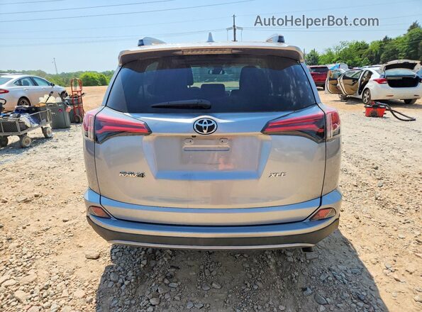 2T3WFREV2HW391791 2017 TOYOTA RAV4 Silver Rear view
