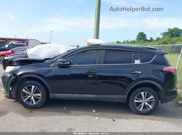 2T3WFREV2JW412516 2018 TOYOTA RAV4 Black Vista interior trasera