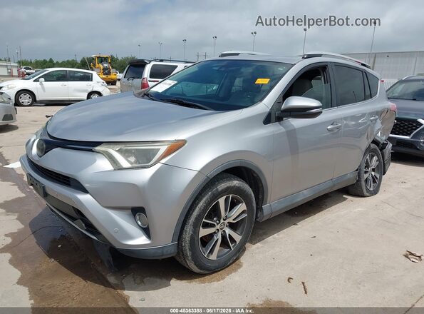 2T3WFREV3GW290225 2016 TOYOTA RAV4 Silver Առջևի ձախ երեք քառորդ տեսարան