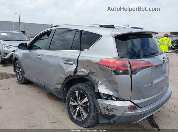 2T3WFREV3GW290225 2016 TOYOTA RAV4 Silver Հետևի ձախ