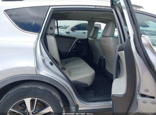 2T3WFREV3GW290225 2016 TOYOTA RAV4 Silver VIN կոդի պիտակի տեսք