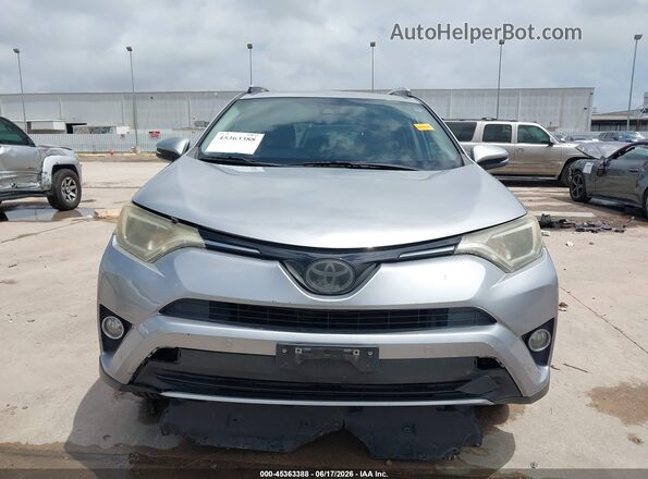 2T3WFREV3GW290225 2016 TOYOTA RAV4 Silver Սարքավորումների վահանակի տեսք
