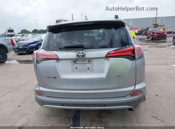 2T3WFREV3GW290225 2016 TOYOTA RAV4 Silver 