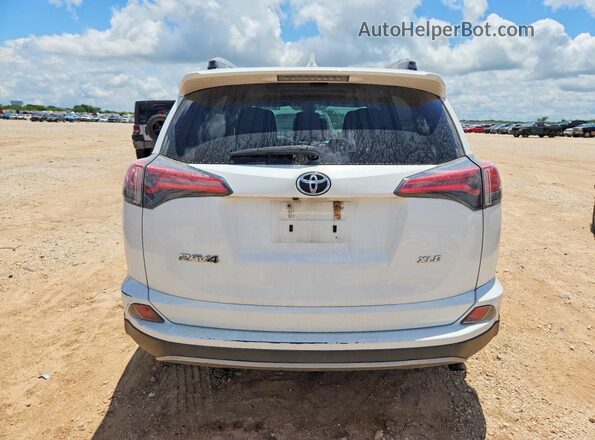 2T3WFREV3JW422925 2018 TOYOTA RAV4 White Rear view