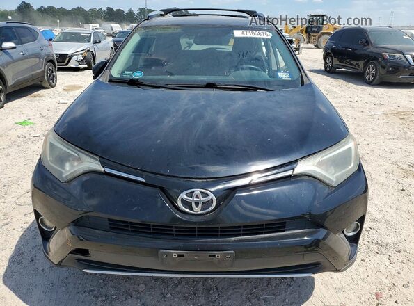 2T3WFREV4GW236111 2016 TOYOTA RAV4 Black Widok z przodu