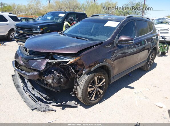 2T3WFREV4GW311504 2016 TOYOTA RAV4 Maroon Front left