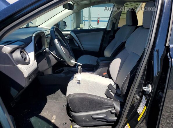 2T3WFREV4HW354340 2017 TOYOTA RAV4 Black Вид салону спереду