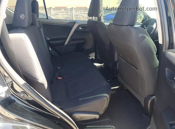 2T3WFREV5HW368828 2017 TOYOTA RAV4 Black Rear seats view