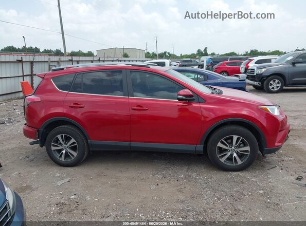 2T3WFREV5HW387220 2017 TOYOTA RAV4 Red Rear interior view