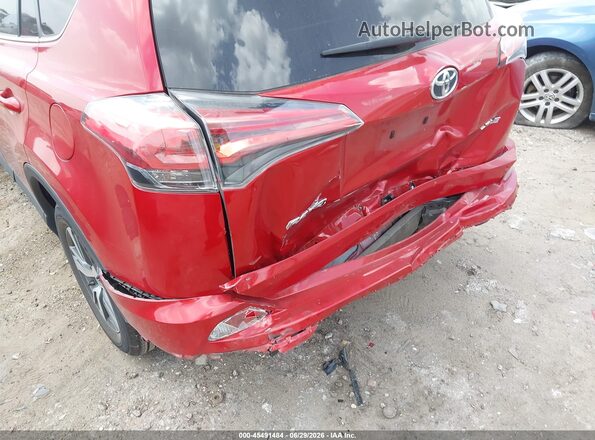 2T3WFREV5HW387220 2017 TOYOTA RAV4 Red Front view
