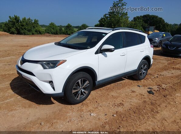 2T3WFREV6JW471701 2018 TOYOTA RAV4 White Vista tres cuartos delantera izquierda