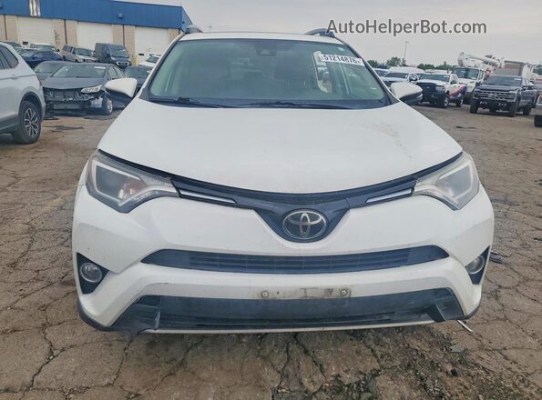 2T3WFREV6JW517513 2018 TOYOTA RAV4 White Front view