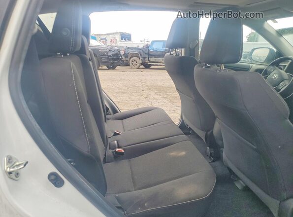 2T3WFREV6JW517513 2018 TOYOTA RAV4 White Rear seats view