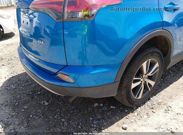 2T3WFREV7HW364568 2017 TOYOTA RAV4 Blue Front view