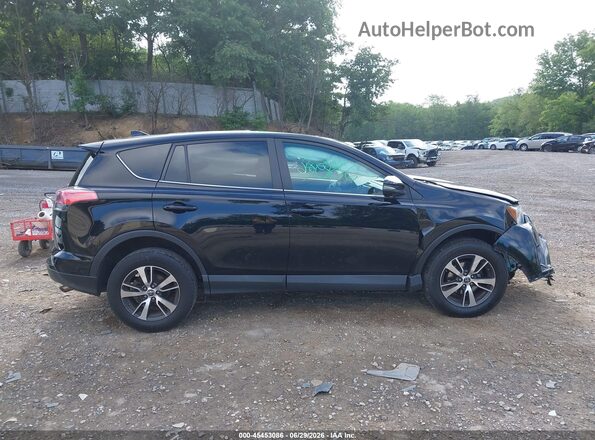 2T3WFREV7JW468371 2018 TOYOTA RAV4 Black უკანა სალონის ხედი