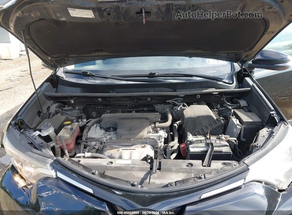 2T3WFREV7JW468371 2018 TOYOTA RAV4 Black უკანა ხედი