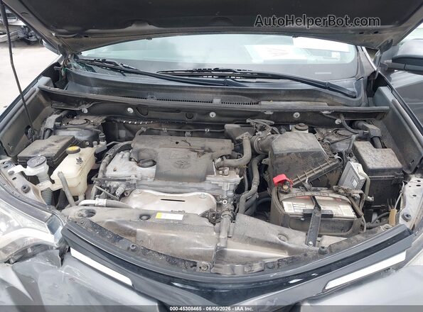 2T3WFREV7JW483209 2018 TOYOTA RAV4 Gray Widok z tyłu