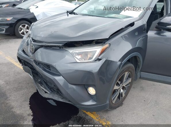 2T3WFREV7JW483209 2018 TOYOTA RAV4 Gray Widok z przodu