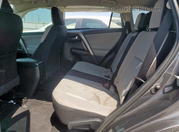 2T3WFREV7JW514880 2018 TOYOTA RAV4 Charcoal Widok wnętrza z tyłu