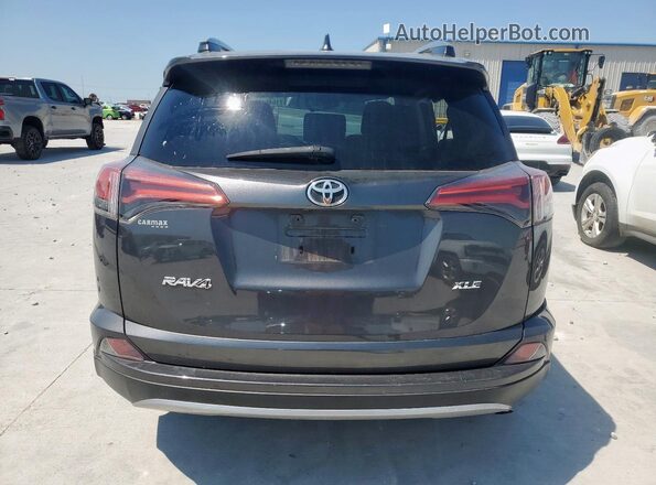 2T3WFREV7JW514880 2018 TOYOTA RAV4 Charcoal Widok z tyłu