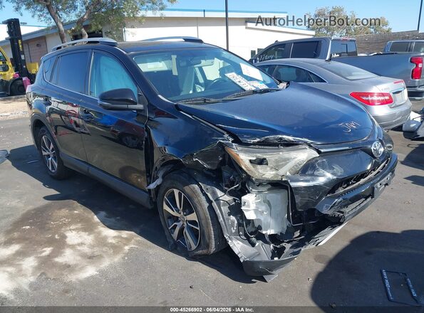 2T3WFREV8GW252389 2016 TOYOTA RAV4 Black Դիմացի տեսք