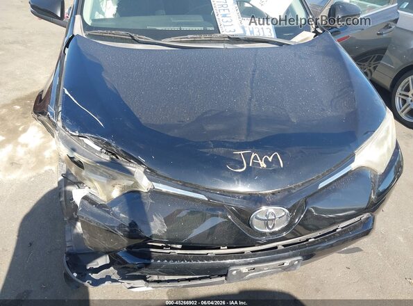 2T3WFREV8GW252389 2016 TOYOTA RAV4 Black Հետևի տեսք