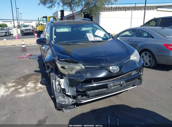 2T3WFREV8GW252389 2016 TOYOTA RAV4 Black Սարքավորումների վահանակի տեսք