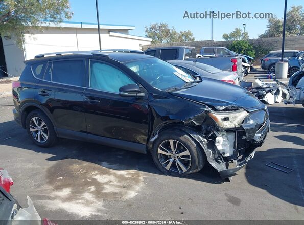 2T3WFREV8GW252389 2016 TOYOTA RAV4 Black Սալոնի հետևի տեսք