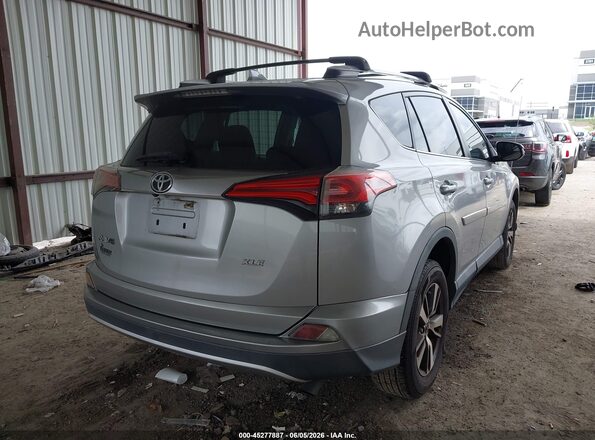 2T3WFREV8GW265367 2016 TOYOTA RAV4 Silver Rear right