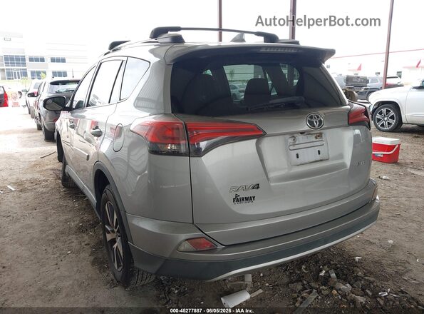 2T3WFREV8GW265367 2016 TOYOTA RAV4 Silver Rear left