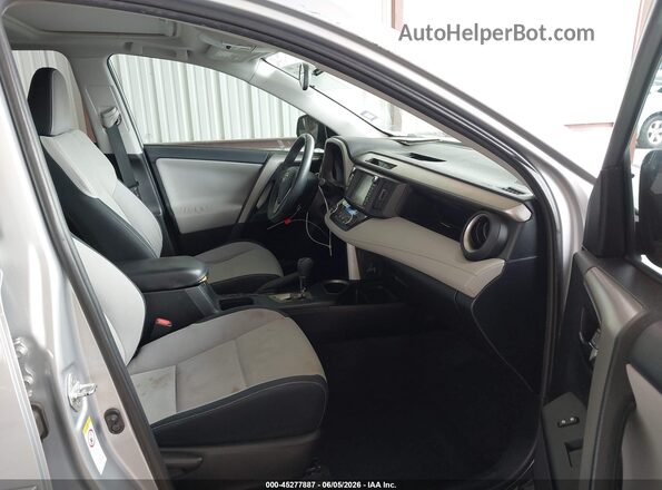 2T3WFREV8GW265367 2016 TOYOTA RAV4 Silver Front interior view