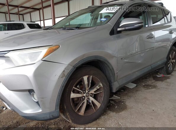 2T3WFREV8GW265367 2016 TOYOTA RAV4 Silver Front view