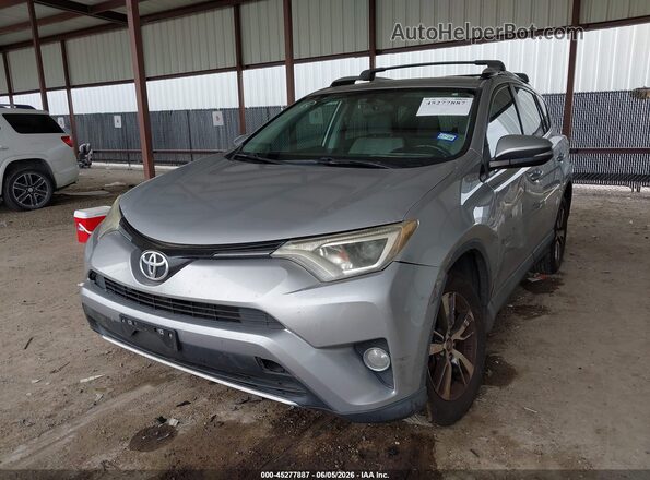 2T3WFREV8GW265367 2016 TOYOTA RAV4 Silver Front left