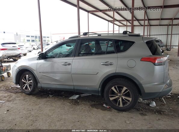 2T3WFREV8GW265367 2016 TOYOTA RAV4 Silver 360 interior view