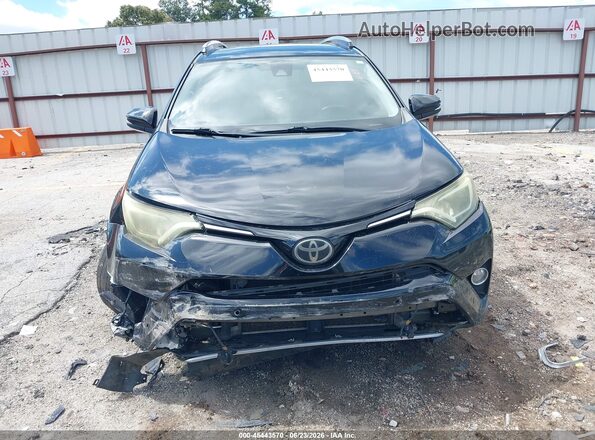 2T3WFREV8HW383517 2017 TOYOTA RAV4 Black Սալոնի հետևի տեսք