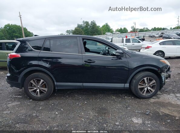 2T3WFREV8JW472316 2018 TOYOTA RAV4 Black Rear interior view