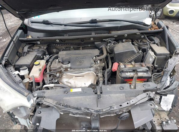 2T3WFREV8JW472316 2018 TOYOTA RAV4 Black Rear view